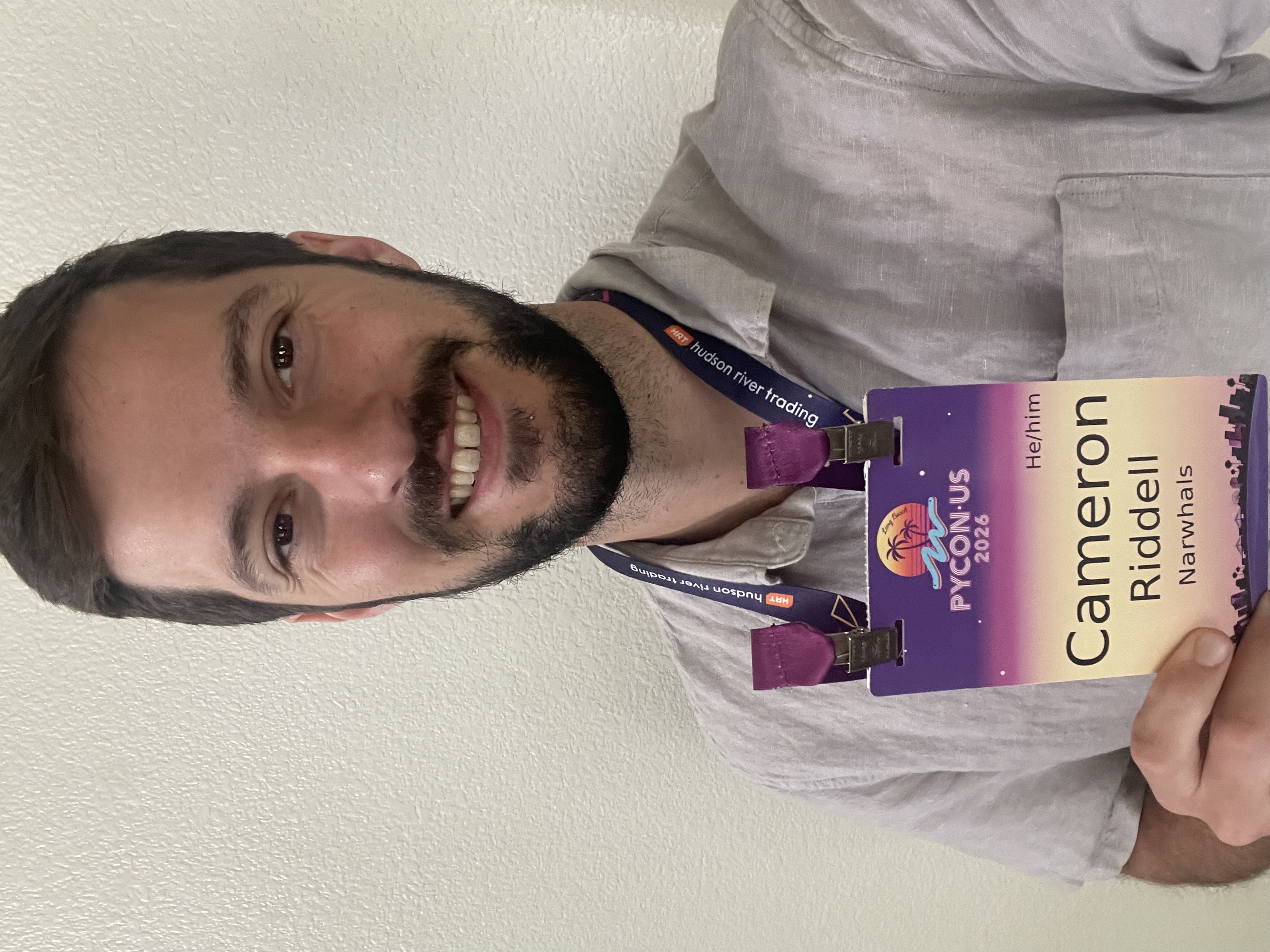 A selfie of Cameron with his PyCon 2026 badge